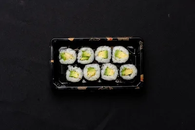 Baby avocado sushi roll box.