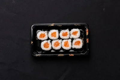 Baby salmon sushi roll box.