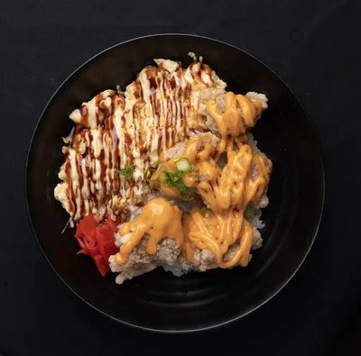 Chicken karaage donburi drizzled with spicy mayo.