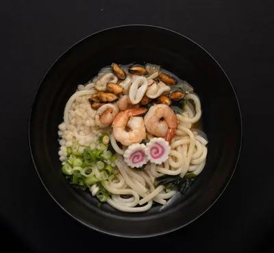 Spicy seafood udon with prawns, mussels and squid.